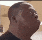 a man with down syndrome is looking up at something