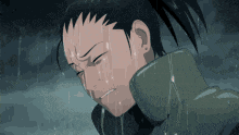 a cartoon character is crying in the rain with tears running down his face