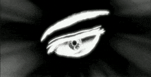 a black and white drawing of a person 's eye with a glowing pupil