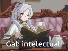 a girl is reading a book while holding a cup of tea and the caption says gab intellectual