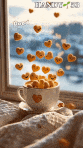 a cup of coffee with hearts coming out of it and the words good handy 53 above it
