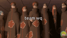 a group of anime characters standing next to each other with the words team wq on the bottom right