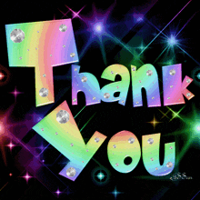 a rainbow colored thank you sign with rhinestones