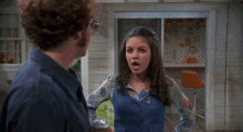 a man and a woman are standing next to each other and the woman says liar i am the bitch and you love me