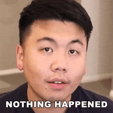 a close up of a man 's face with the words nothing happened above him