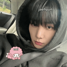 a person with the name jaehyun written on their forehead