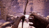 a person holding a bow and arrow with a feather in their hand