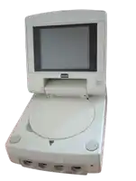 a white dreamcast video game console with a screen