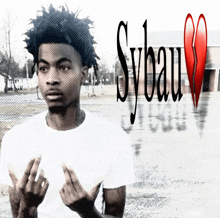 a young man giving the middle finger with sybau written in the background