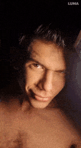 a close up of a man 's face with the word luma in the corner