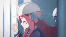a girl with red hair is wearing a white hard hat