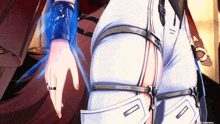 a close up of a person 's butt with a ring on her finger