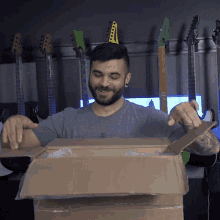 Opening The Box Andrew Baena GIF - Opening The Box Andrew Baena Unboxing GIFs