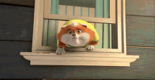 a cartoon cat is looking out of a window with a sad look on its face