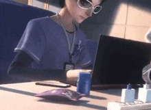a cartoon character is sitting at a desk using a laptop computer