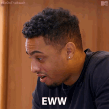 a man in a black shirt says eww in front of a mtv logo