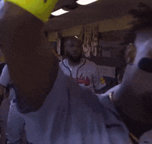 a baseball player wearing a jersey that says kansas city