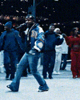 a man in a varsity jacket with the letter b on it