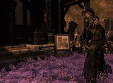 a person standing in a field of purple flowers with a heart in the background