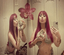 a woman with red hair is taking a selfie