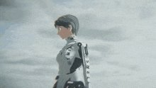 a woman in a white suit with the word shell on the sleeves