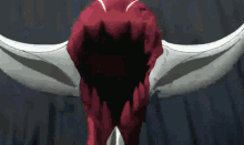 a close up of a monster 's mouth with a knife in it 's mouth .
