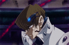 a close up of a person 's face with a blue light on their head