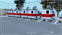 several sns vans are parked in a row in a parking lot