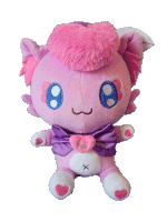 a purple stuffed animal with a purple cape