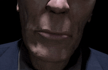 a close up of a man 's mouth with a beard