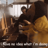 a mascot playing a piano with the words i have no idea what i 'm doing below him