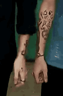 Larry Tattoos GIFs | Tenor