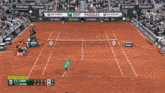 a tennis court with emirates and bnp paribas ads on the side