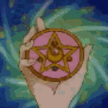 a pixelated image of a hand holding a circular object with the year 1991 on it