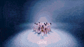a group of people are standing in a circle and the word choom is on the bottom