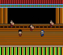 a video game shows a group of people on a stage with a black background