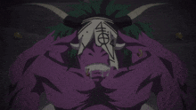 a purple monster with horns has a symbol on his face
