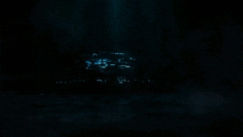 a dark background with a blue circle in the middle and the word hire on it