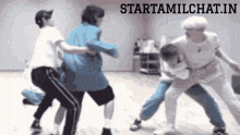 a group of people are dancing in a room with the words starttamilchat.in written above them