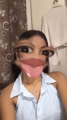 a woman is taking a selfie with a fake mouth