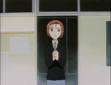 a girl with red hair is standing in front of a door