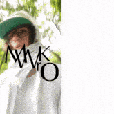 a man wearing a green hat and glasses is next to a logo for mr. wk