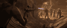 a man is holding a rifle in front of a group of people with lightsabers