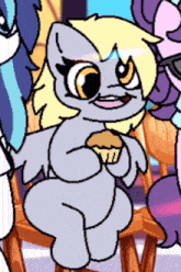 a drawing of a pony holding a muffin