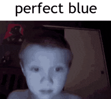 a picture of a child 's face with the words perfect blue above it