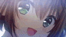 a close up of a girl 's face with a red tongue out
