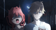 a boy and a girl are standing next to each other and the girl is crying