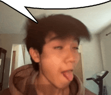 a man sticking his tongue out with a white speech bubble above his head