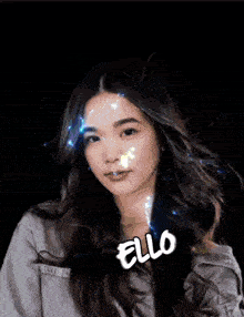 a woman with a sticker on her face that says ' ello '