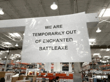 a sign in a store says that they are temporarily out of enchanted battleaxe